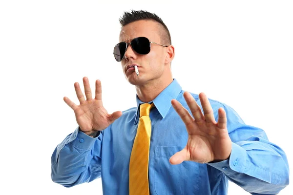 Businessman smokes a cigarette — Stock Photo, Image