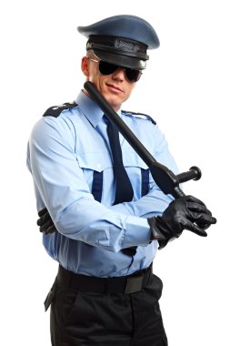 Polis Cop elinde tutar.