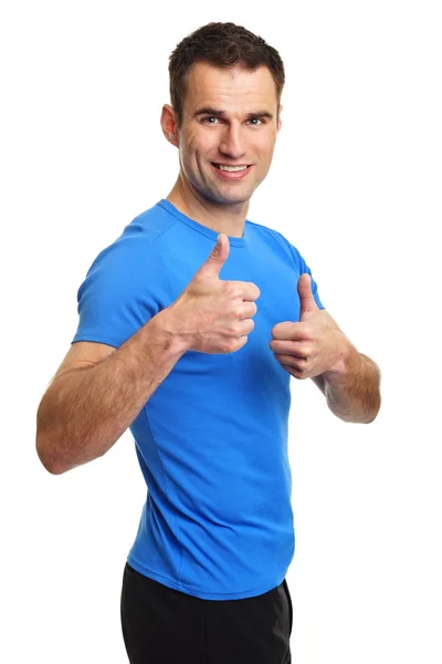 Businessman standing shows thumbs up — Stock Photo, Image