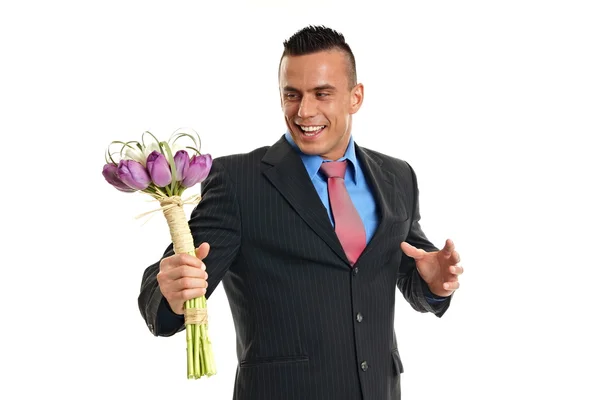 Homme tient bouquet de fleurs tulipes — Photo