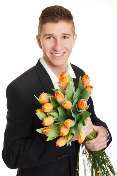 Man holds bouquet of tulips — Stock Photo, Image
