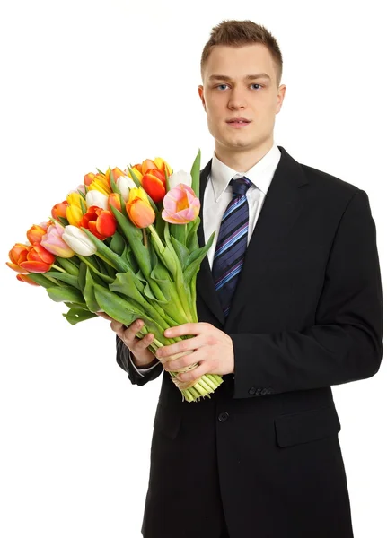 Muž drží kytici tulipánů — Stock fotografie