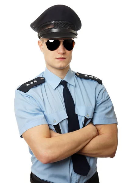 Sorrindo policial em uniforme com óculos de sol — Fotografia de Stock