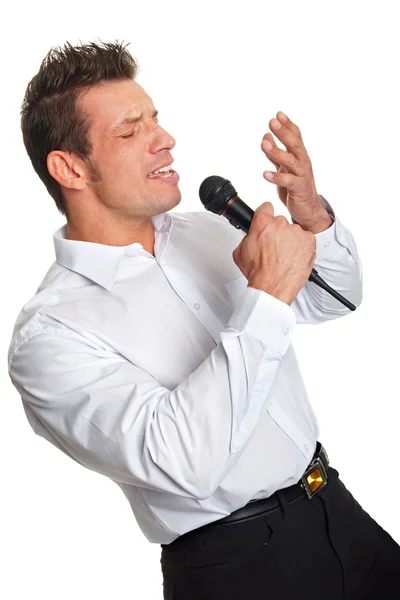 Businessman sings into the microphone — Stock Photo, Image