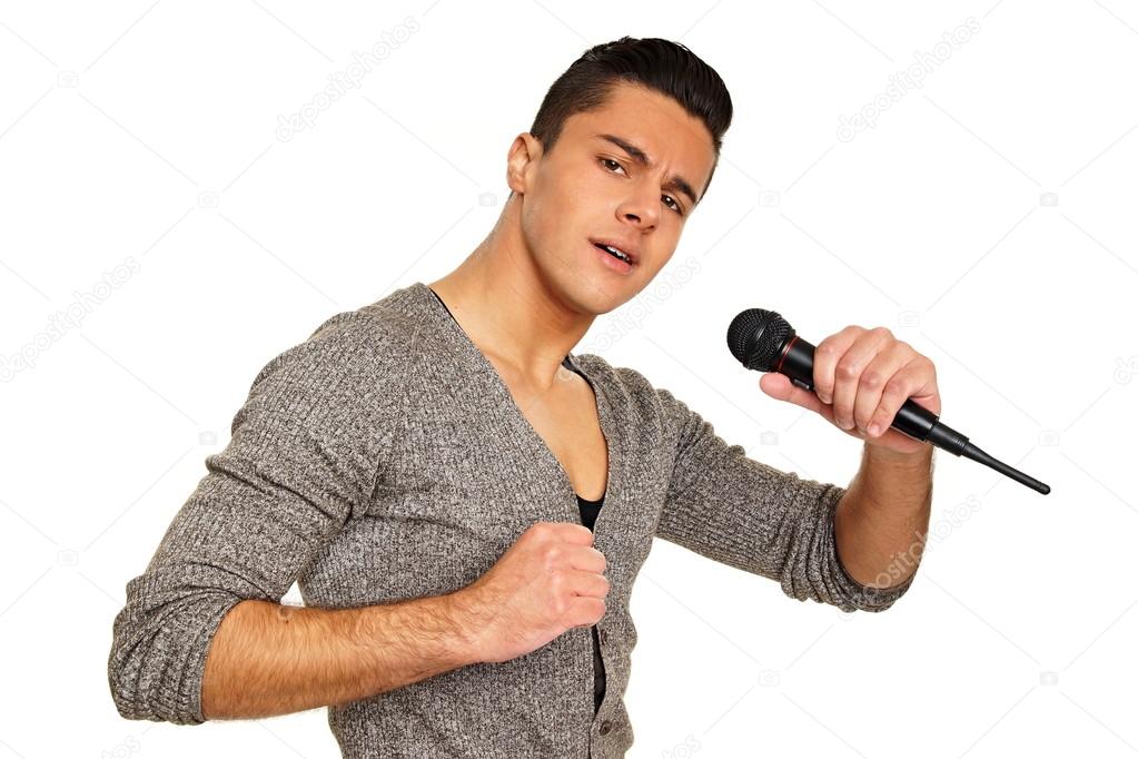 Businessman sings into the microphone