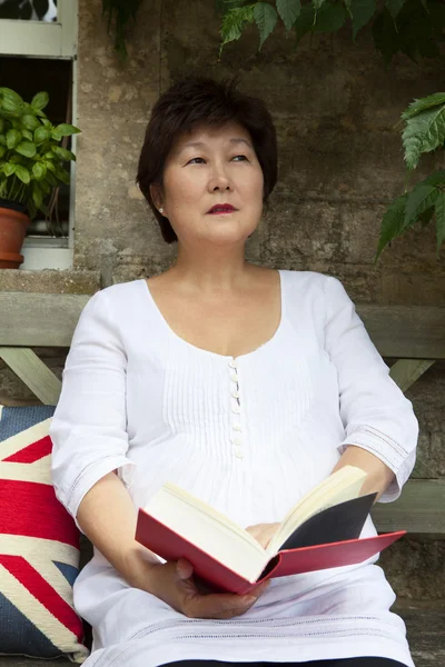 Eastern woman reading