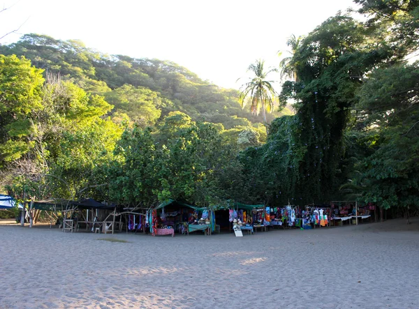 Locals Prepare to Sell Goods on Beach