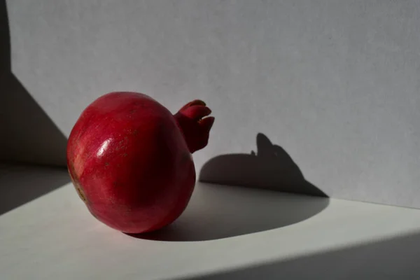 Ripe Pomegranate Its Shadow White Background — Stock Photo, Image