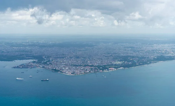 Aerial view on Stone Town, the major city of Zanzibar. Zanzibar is a tanzanian island in the indian ocean, blue ocean sea background