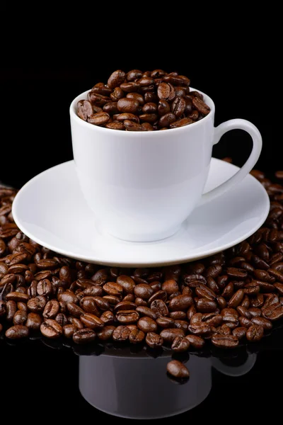 Coffee beans in white cup — Stock Photo, Image