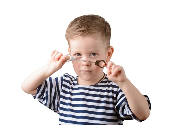 Little boy with toy handcuffs — Stock Photo, Image