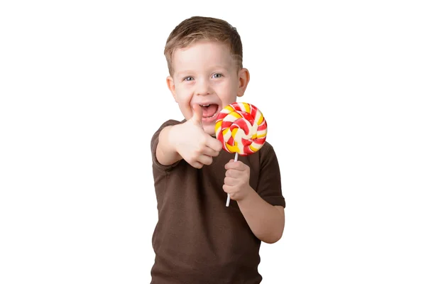 Bambino mostrando pollice fresco — Foto Stock