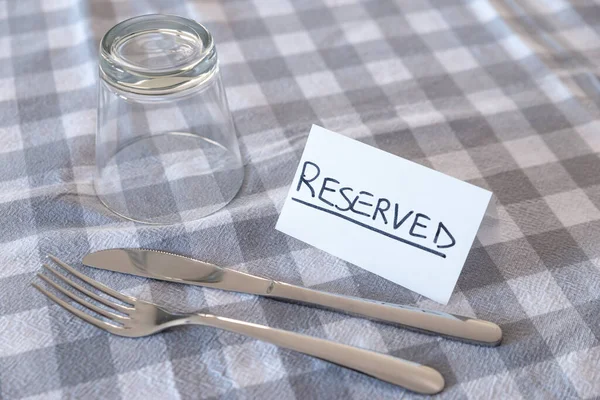 Knife Fork Glass Card Reserved Text Gray Checked Tablecloth Booking — Stock Photo, Image