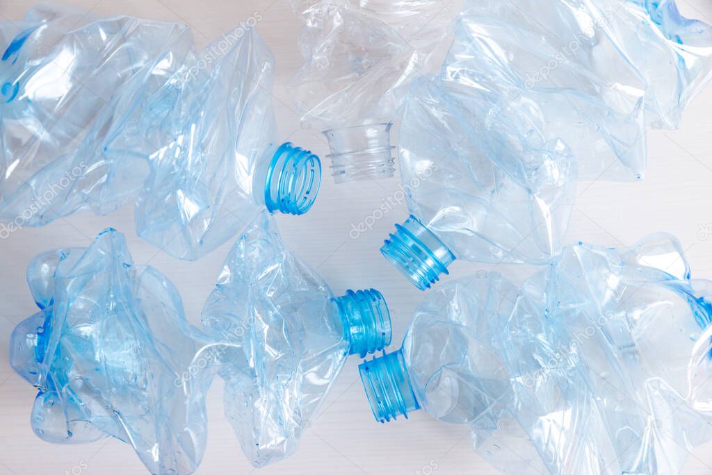 Crushed or crumpled clear plastic bottles. Plastic waste. Plastic