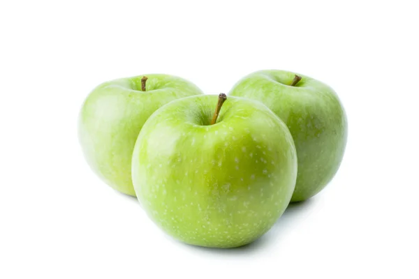 Tre grönt äpple — Stockfoto