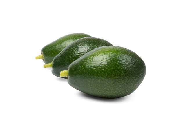 Drei Avocados auf weißem Hintergrund — Stockfoto