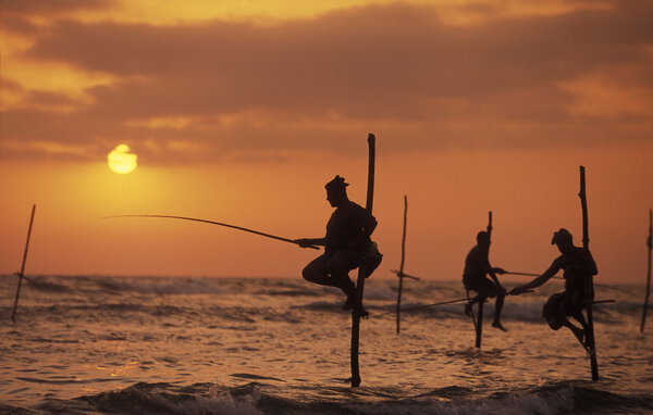 Fishermen at the coast of Weligama