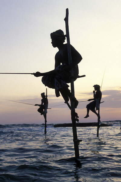 Fishermen at the coast of Weligama