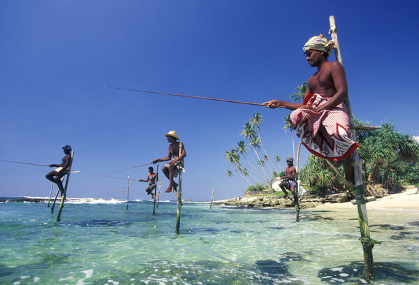 Fishermen at the coast of Weligama