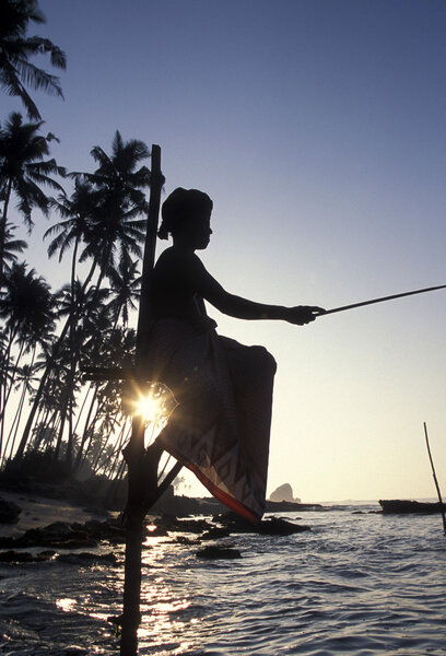 Fisherman at the coast of Weligama
