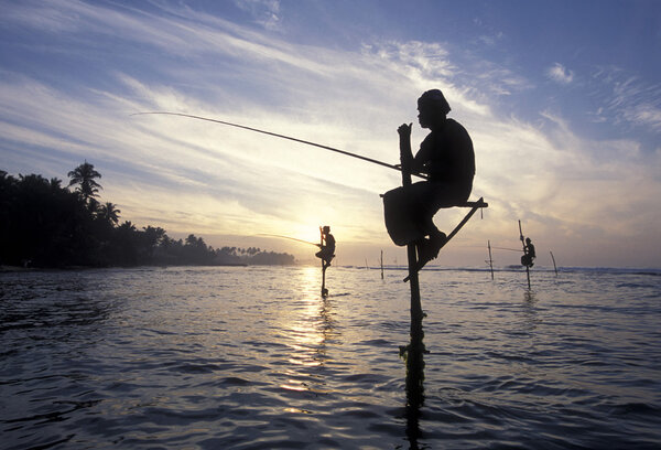 Fishermen at the coast of Weligama