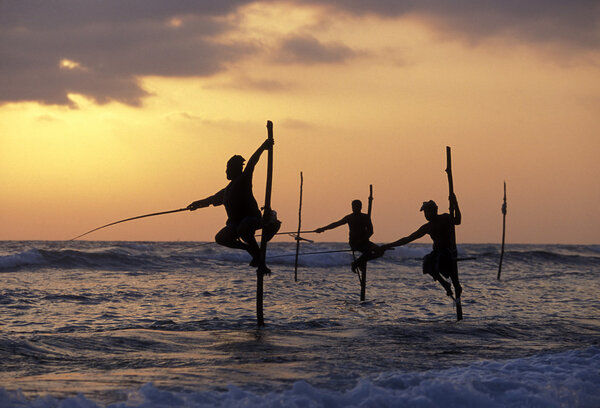 Fishermen at the coast of Weligama