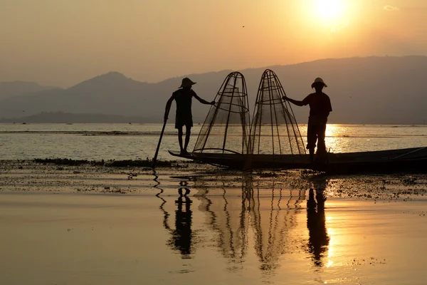 Fishermen on wooden boats with creels — Stock Photo, Image