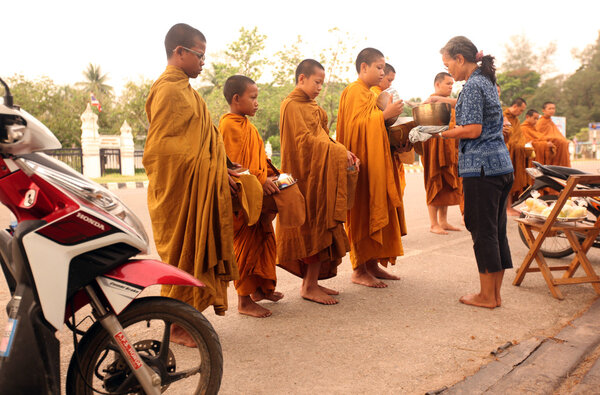 Monks at market in Sukothai