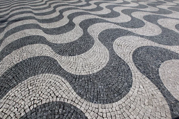 Piedra pavimentada tradicional en Lisboa — Foto de Stock