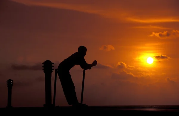 Man on evening beach — Stock Photo, Image