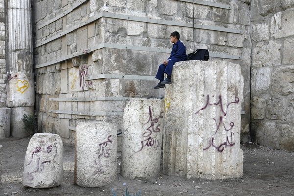 Boy on column at Umayyad Mosque