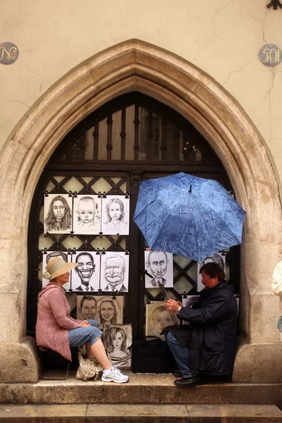Pouliční umělec na náměstí Rynek Główny — Stock fotografie