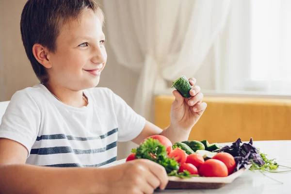 Boy Sitting Kitchen Eating Healthy Vegetables Cucumber Tomato — Stock Photo, Image