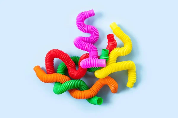 Colorato Stress Fidget Push Pop Tube Giocattoli Sensoriali Bambini Sfondo — Foto Stock