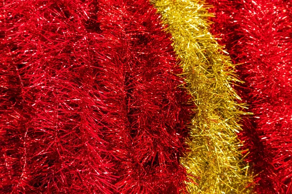 Christmas tinsel closeup, festive background photo Stock Picture