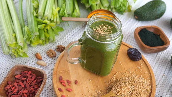 Healthy Vegan Lifestyle With Superfood Concept. Green Smoothie In A Jar.