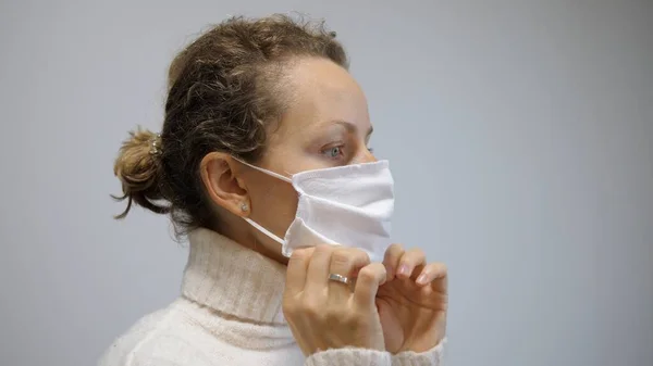 Woman Wearing An Anti Virus Protection Mask To Prevent From Corona COVID-19 and SARS Infection.