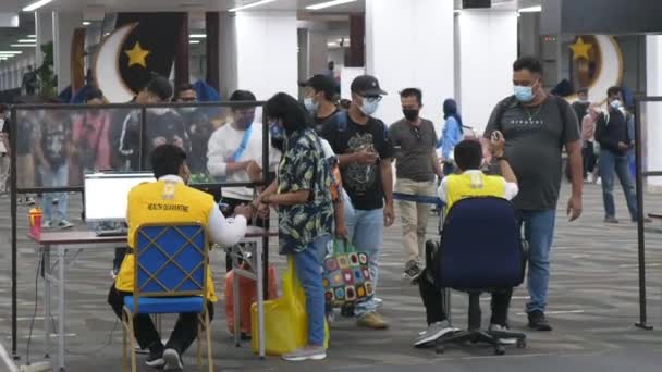 Health control in airport. Scan covid tests and vaccinations Passengers going through check to get on the plane. Bali-June-2021 — Stock Video
