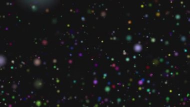 Animasyon artalanları doku siyah üzerine düşen renkli küre orbs.