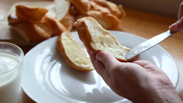 Spread Bread with Butter and Drinking Milk. Breakfast. — Stock Video