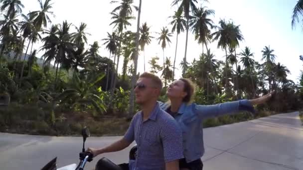 Couple Riding Motorcycle against Sunset. Slow Motion. — Stock Video