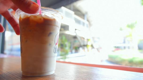 Male Hand Stirring Iced Coffee in Cafe — Stock Video