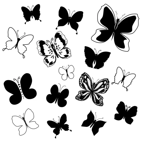 Collection of flying butterflies silhouettes — Stock Vector