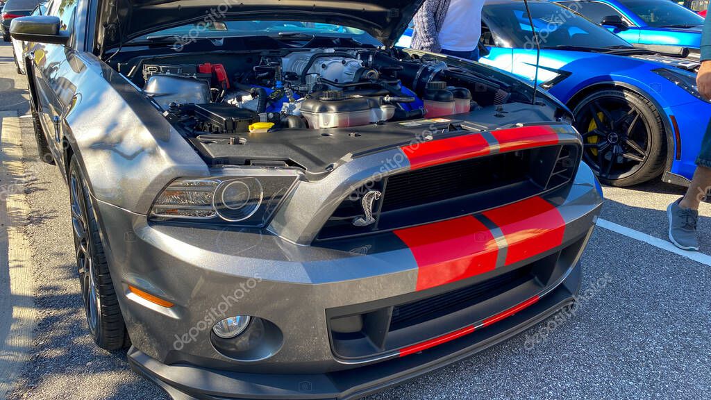 Orlando, FL USA  - March 1, 2020: A Shelby Cobra automobile in a free to the public Cars and Coffee car show.
