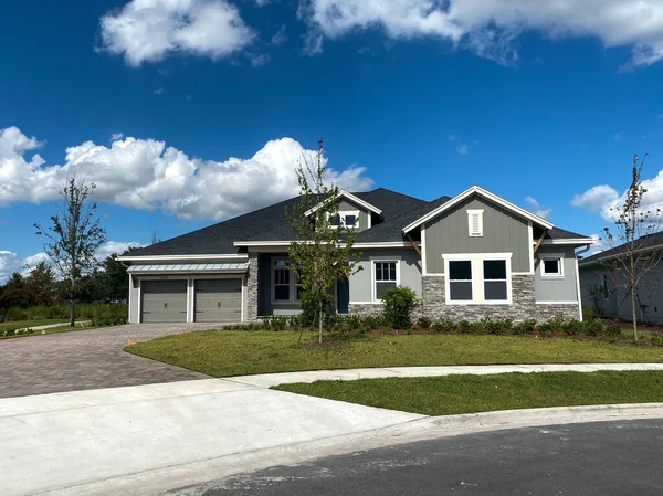 A luxury gray house in the Laureate Park neighborhood in Lake Nona Orlando, Florida.