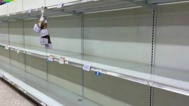 Orlando, FL USA - February 16, 2020:  Zooming out on empty shelves at a Publix grocery store in Orlando, Florida.