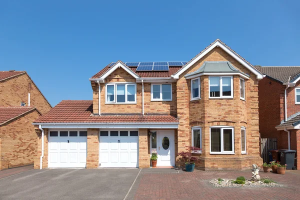 Modern english house with double garage — Stock Photo, Image