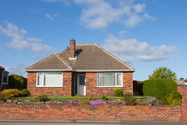 Bricky bungalow with beautiful garden Stock Picture