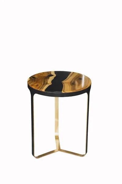 Small epoxy coffee table on white background. Interior element