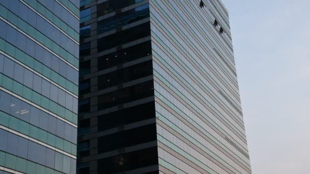 Glass building in evening time, Timelapse — Stock Video